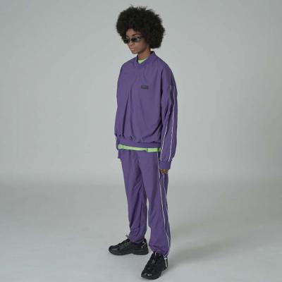 Woven line training pants-purple